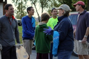 Group enjoys a break and a laugh at Fall Cleanup